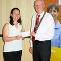 Natalie Atherley receiving cheque from John Balshaw