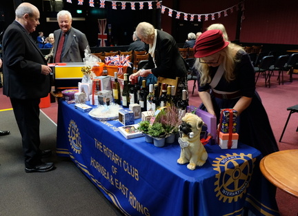 Rotarians preparing for the Raffle prizes